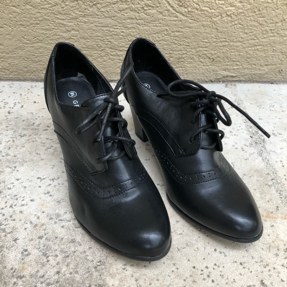 Brand new black bootie heals